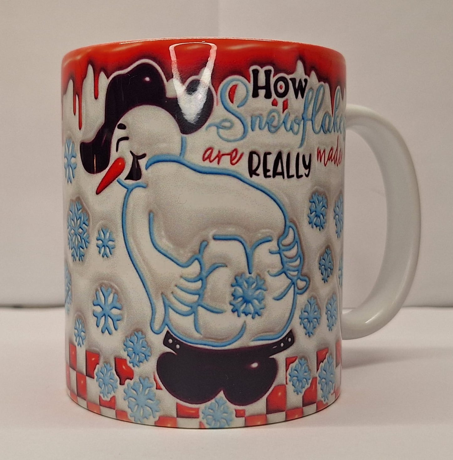 „Weiße Keramiktasse mit Schneemann-Motiv Produktbild“